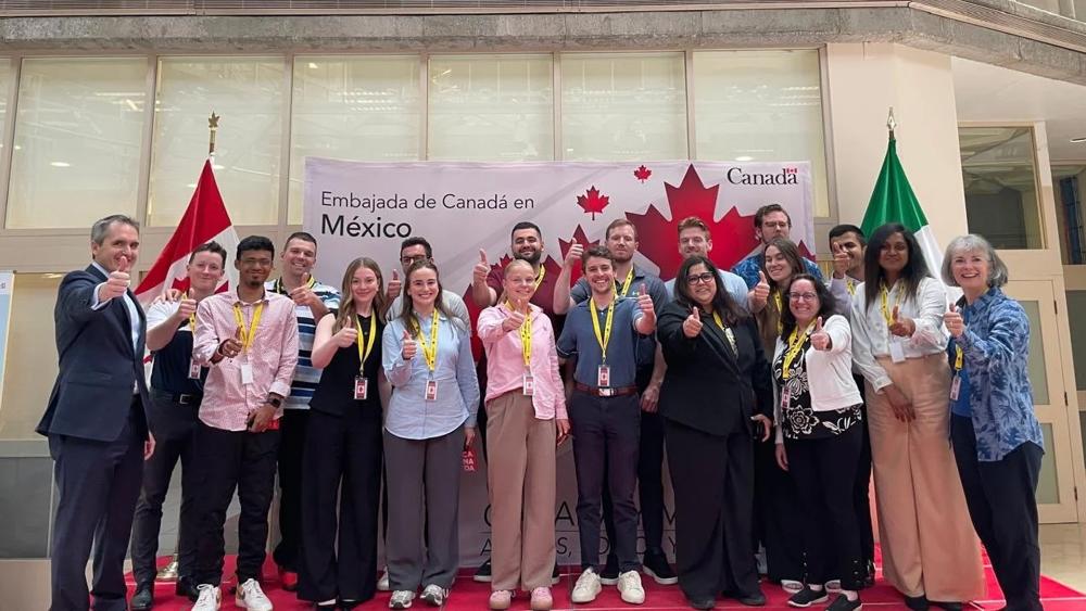 A group of MBA students at the Canadian Embassy in Mexico.